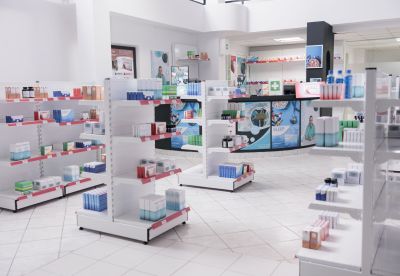 Empty pharmacy store full with pharmaceutical product and treatment on shelves, used by customers to buy healthcare vitamins and supplements. Medicine support service and concept